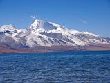 12 Gurla Mandhata And Lake Manasarovar From Seralung Gompa Gurla Mandhata (7728m) close up across Lake Manasarovar from Seralung Gompa.